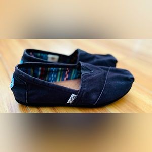 Black Tom’s slip ons